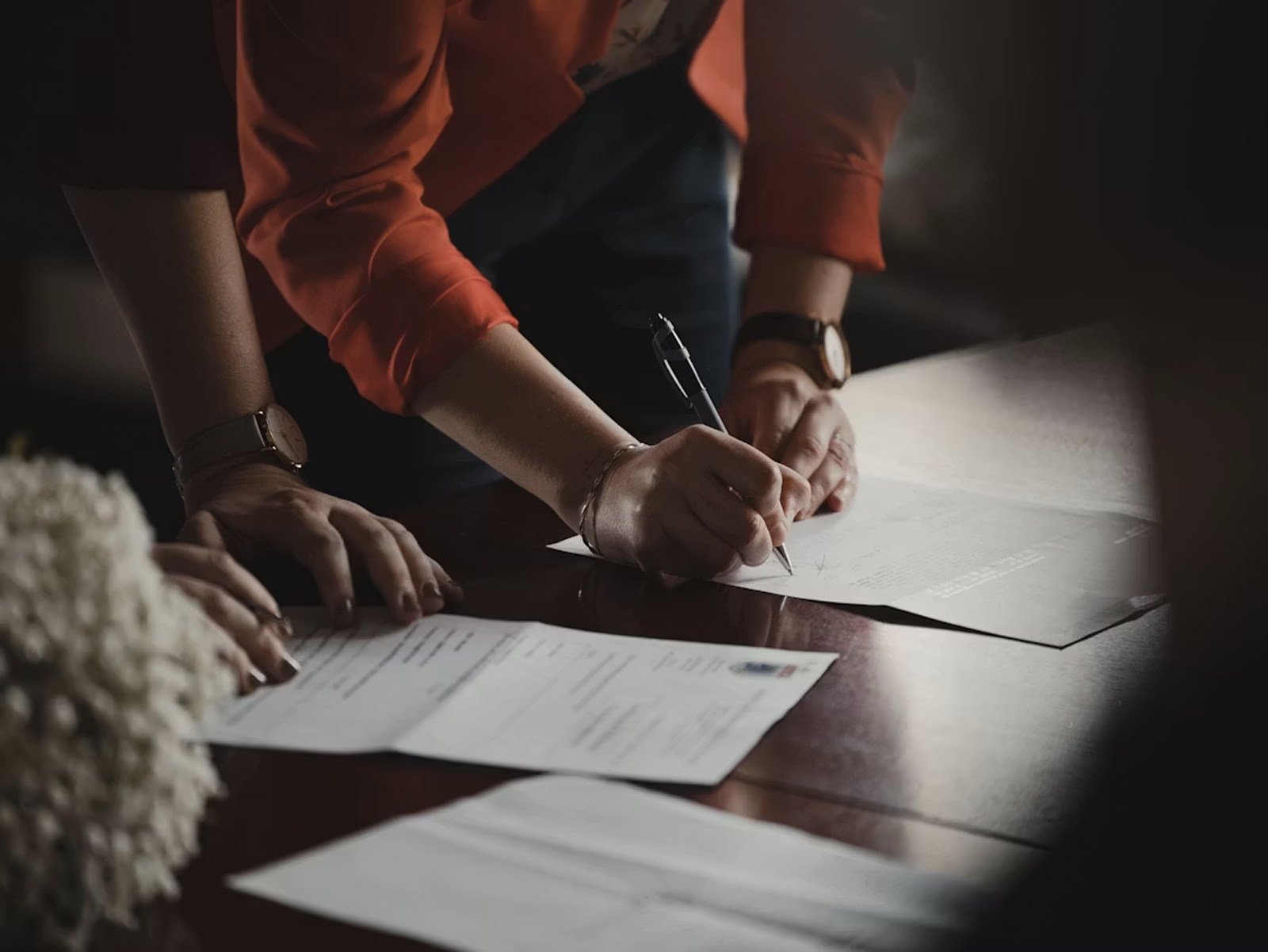 Trade documents being reviewed and signed